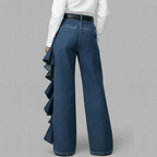 GENEDA PANTALÓN VAQUERO WIDE LEG CON VOLANTE ASIMÉTRICO