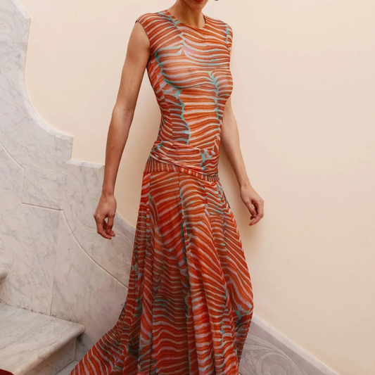 ILARIA CONJUNTO DE FALDA Y BODY TRANSLÚCIDO